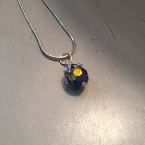 Silver necklace with black iridescent bead charm